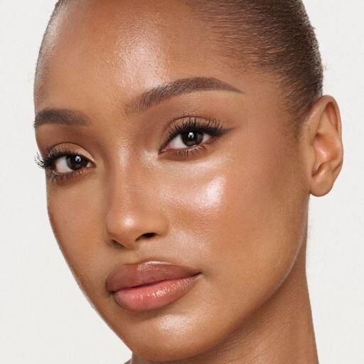 UNREAL SKIN SHEER GLOW TINT NAWILŻAJĄCY PODKŁAD W SZTIFCIE 10 TAN