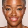UNREAL SKIN SHEER GLOW TINT NAWILŻAJĄCY PODKŁAD W SZTIFCIE 12.5 TAN